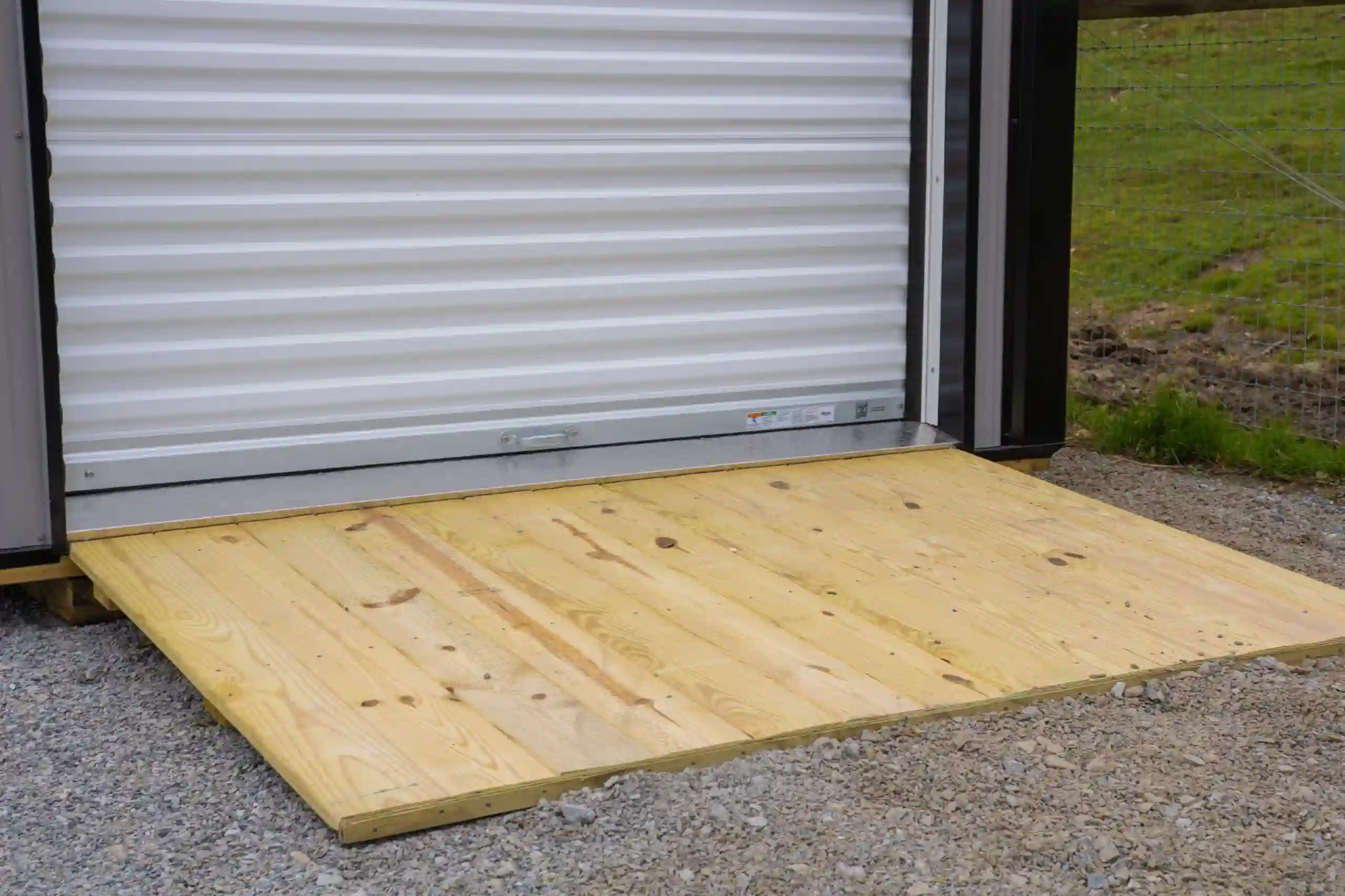A close-up of the heavy-duty wooden loading ramp, providing easy, no-step access to your storage unit.